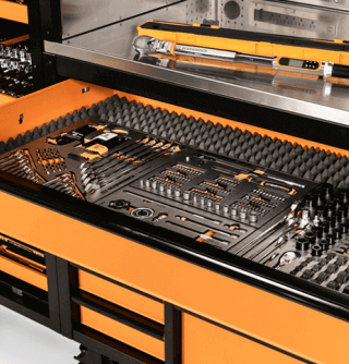 MEGAMOD1858 set with drawer pulled out showcasing GEARWRENCH tools in premium foam with a electronic torque wrench sitting on top of the tool cabinet