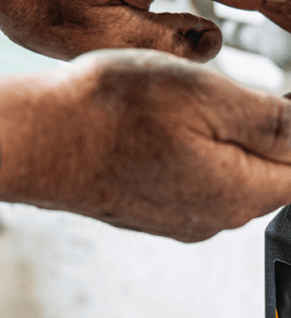 Male pumping GEARWRENCH soap into his greasy hands