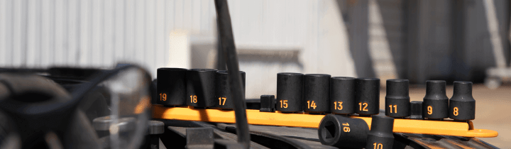 GEARWRENCH hi-viz impact socket set sitting on top of a tool cart