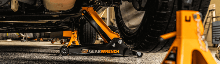 GEARWRENCH floor jack and jack standing lifting and holding a car up