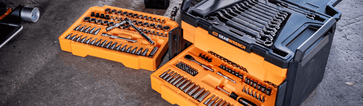 GEARWRENCH 3 drawer master mechanic set open and sitting on a garage floor