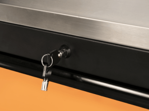 Close-up image of a key in the lock of a GEARWRENCH rolling cabinet