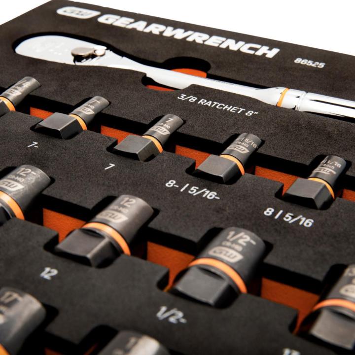 Close-up of the GEARWRENCH foam tray showing the ratchet above rows of Bolt Biter sockets in labeled slots. Visible text includes “GEARWRENCH” and “31 PIECE 3/8 DRIVE.”