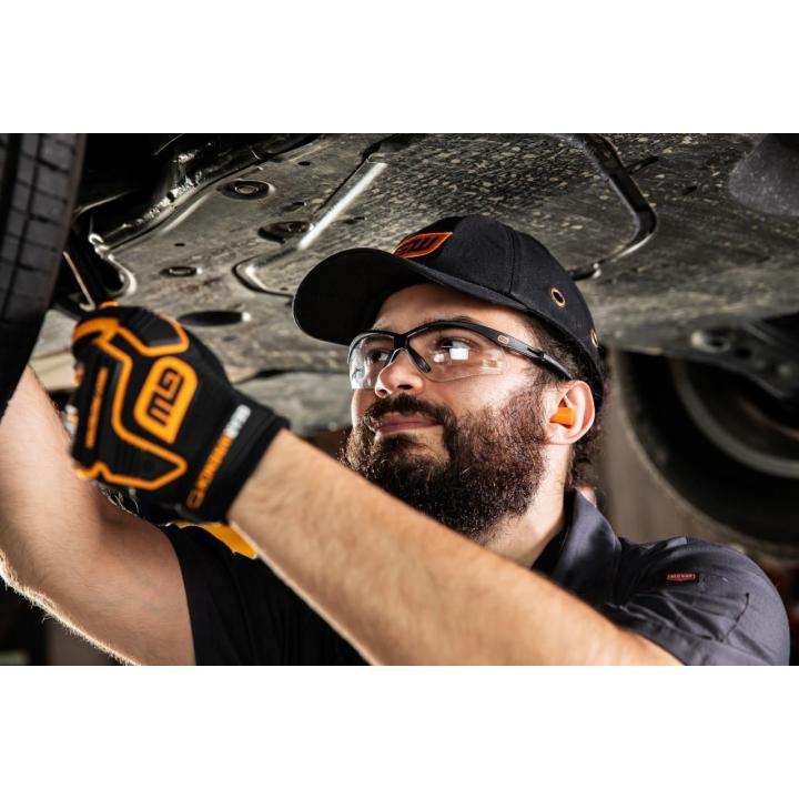 Image of the Baseball Style Bump Cap  showing a person wearing the bump cap working on a tire