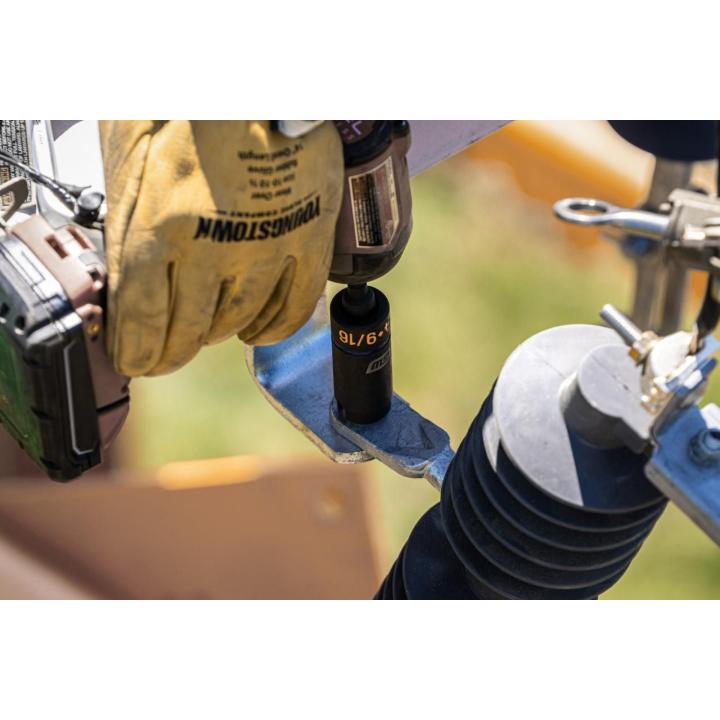 GEARWRENCH 1/2 in. drive 3-in-1 lineman 9/16 in. x 3/4 in. slotted deep impact socket tightening utility hardware with an impact wrench.