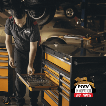 Mechanic getting tools from his MEGAMOD foam tray in tool chest with PTEN Innovation Award Winner logo