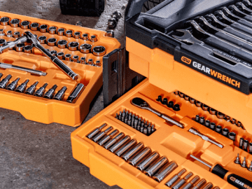 GEARWRENCH 3 drawer master mechanic set open and sitting on a garage floor